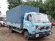 1992 MAN G 90 6.100 Van or truck up to 7.5t Stake body and tarpaulin photo 1