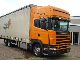 2004 SCANIA 4 - series 164 L/480 Truck over 7.5t Stake body and tarpaulin photo 1